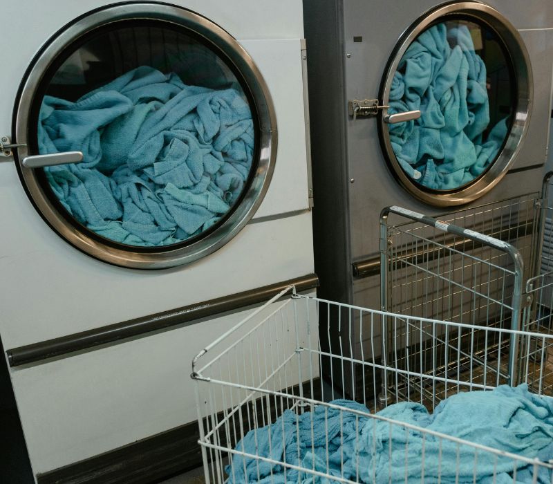 2 washing machines cleaning clothes